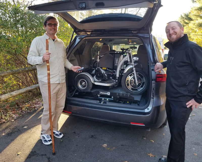 Chris Prouty and Aaron Morse in front of a completed lift for the Triad 750 CSX
