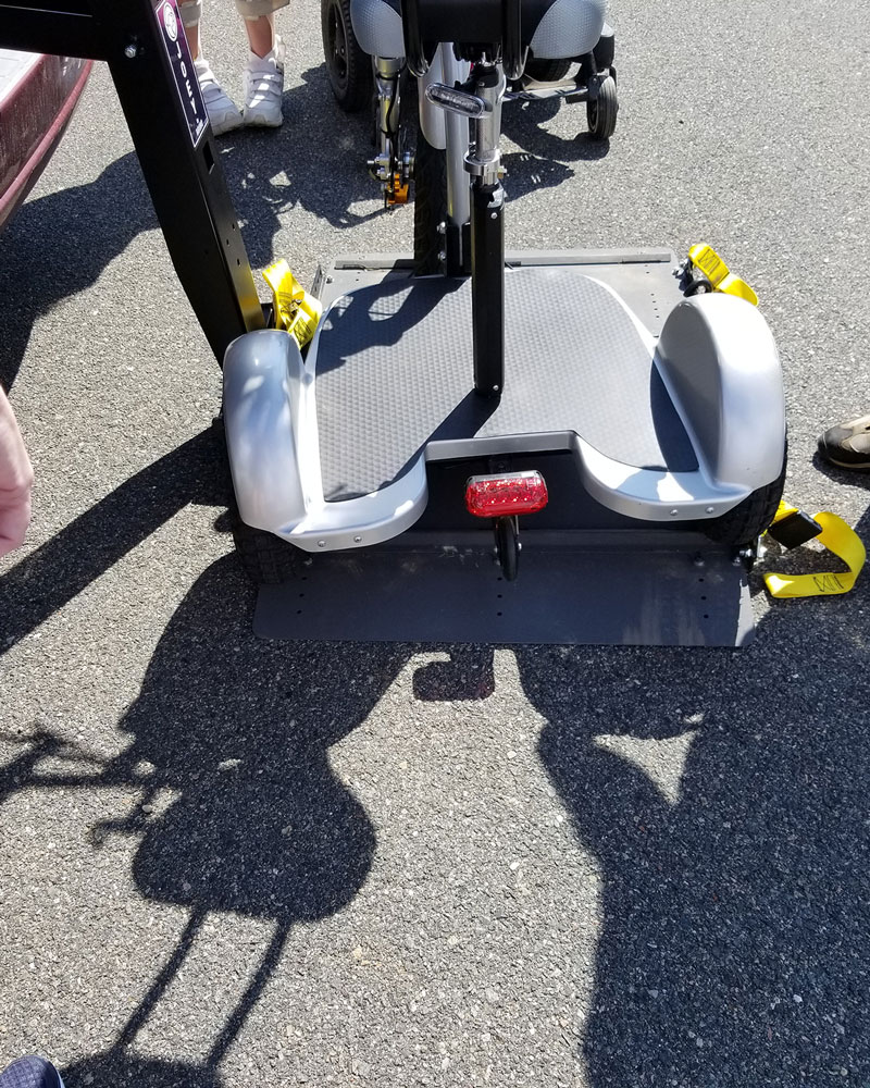 Back Tires of the Triad 750 CSX on an older Bruno Joey Lift