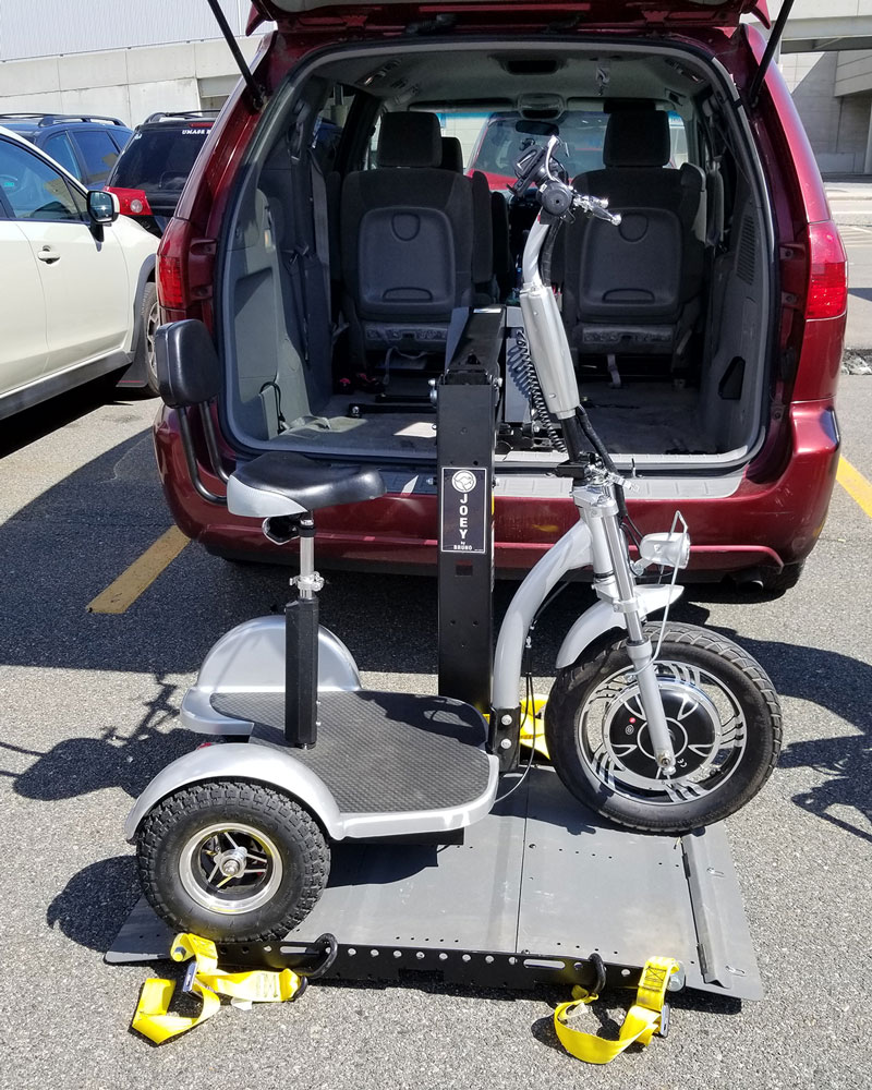 Side View of the Triad 750 CSX on an older Bruno Joey Lift